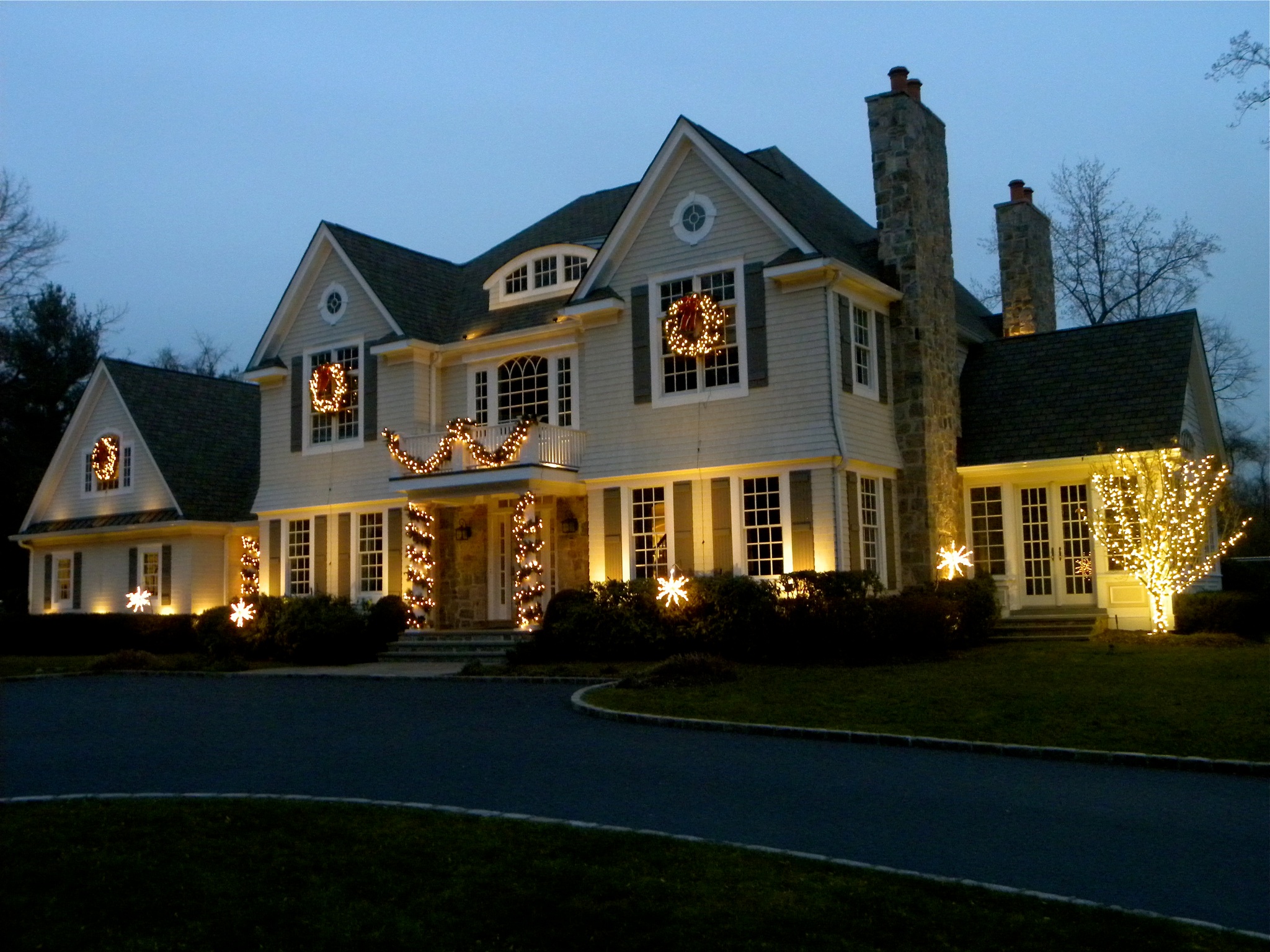Exterior home with holiday lighting